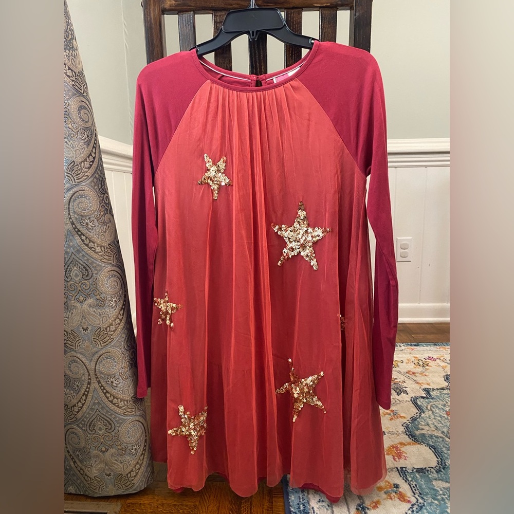 Red sequenced star dress.